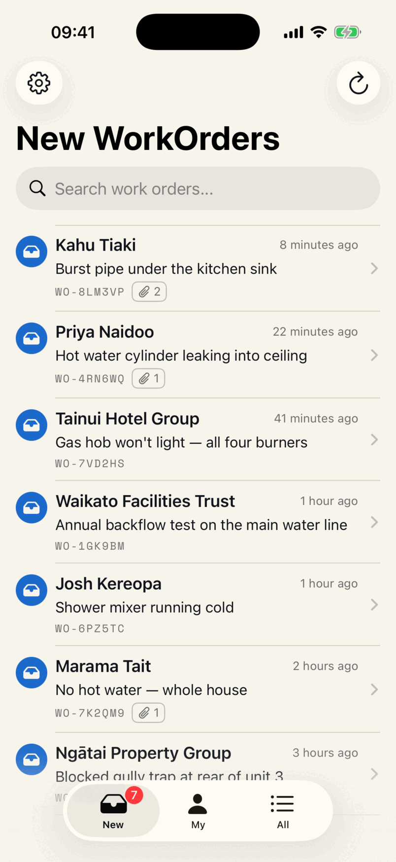 The app's New WorkOrders list: seven unclaimed jobs, each with the customer, what is wrong, a WO- reference, how long ago it arrived and how many files came with it.